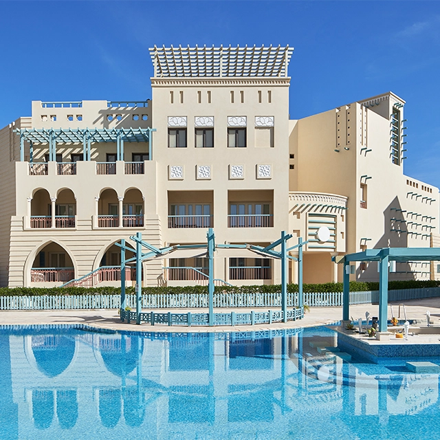 The poolside view of the hotel.