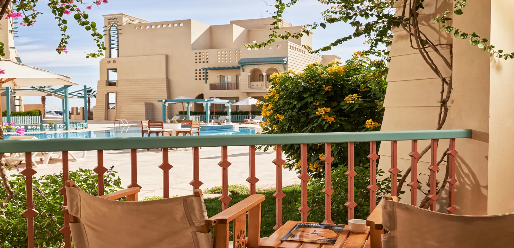 The terrace overlooking the pool at Mosaique Hotel.