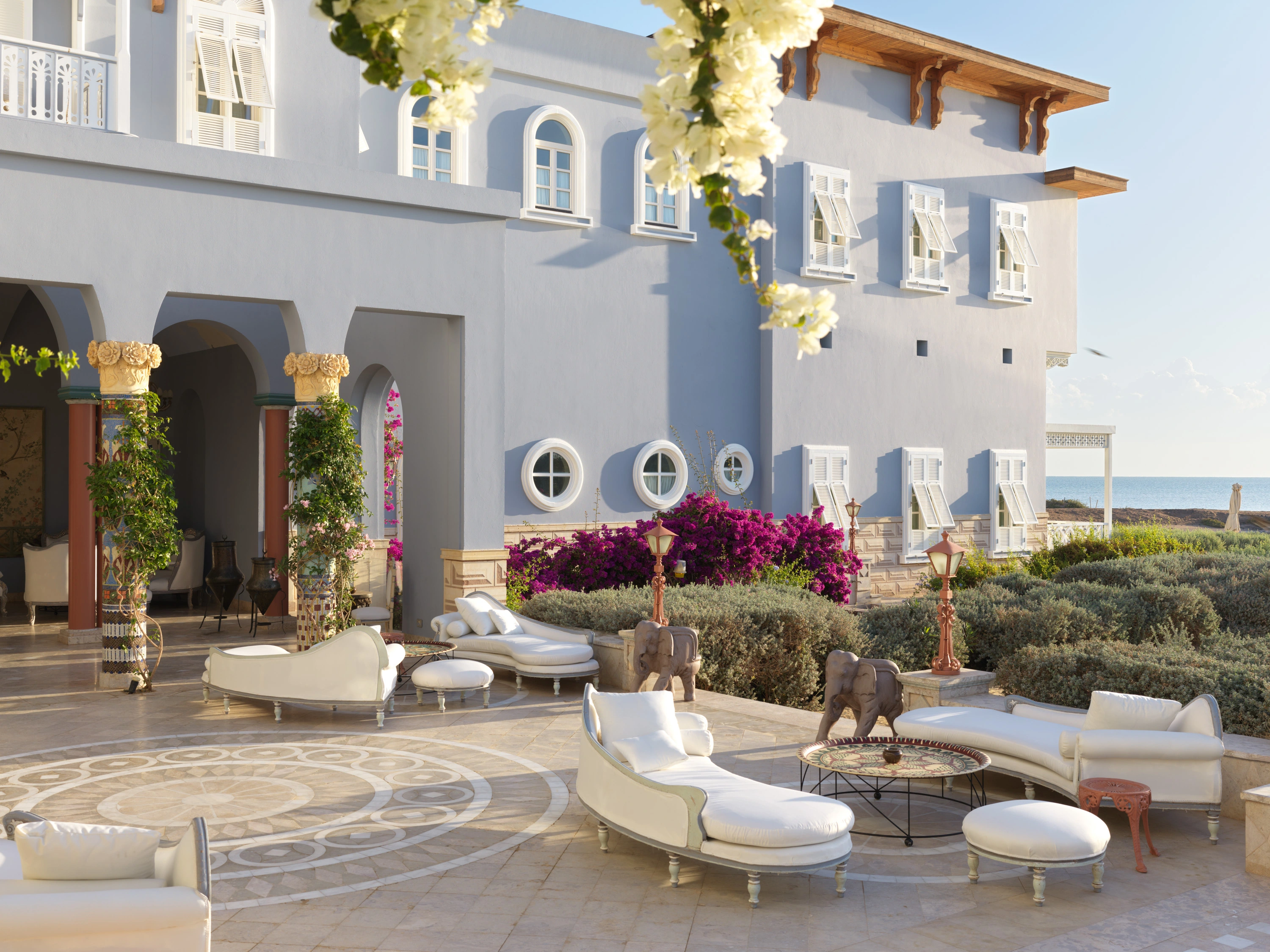 Scenic relaxation area bathed in beautiful sunlight at La Maison Bleue el Gouna.