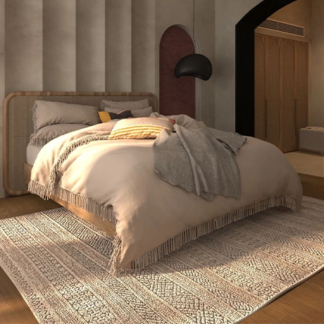 Villa Coconut featuring a king-size bed with elegant bedding. The room is spacious and stylishly decorated, with large windows providing natural light.